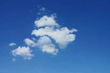 white clouds on blue sky on a sunny day