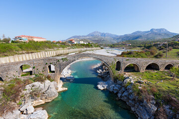 Fototapeta na wymiar Historical Mesi Bridge near the city of Shkoder in Albania
