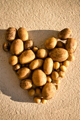 a potato heart in the sunset