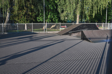 Skate area at sunset light with long shadows. 