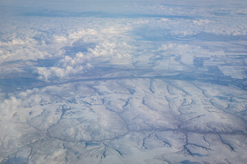 Aerial view of the snow covered river