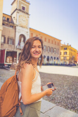 happy Tourist visit city center of Modena in the main square of the city. Major destination in Emilia-Romagna, Italy