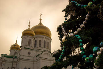 Foggy church and Christmas tree