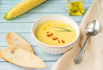 Creamy young corn soup with paprika