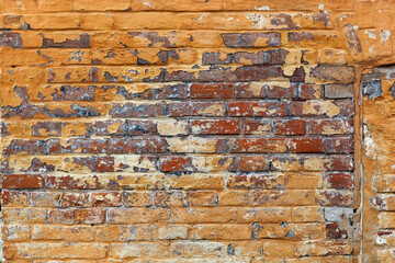 Close up of old damaged brick wall.