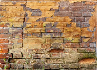 Close up of old damaged brick wall.