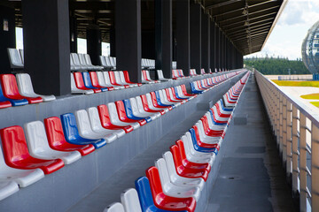 Empty spectator stands, empty chairs