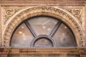 Arch Shaped Window of a Commericial Building