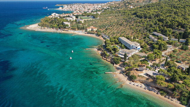 Aerial drone photo of Hinitsa bay a popular anchorage crystal clear turquoise sea bay for yachts and sail boats next to Porto Heli, Saronic gulf, Greece