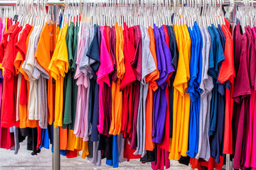 Rack of Brightly Coloured Tee Shirts
