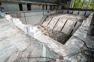 Azure Swimming Pool in Pripyat, Chernobyl exclusion Zone. Chernobyl Nuclear Power Plant Zone of...
