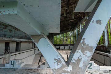 Azure Swimming Pool in Pripyat, Chernobyl exclusion Zone. Chernobyl Nuclear Power Plant Zone of...