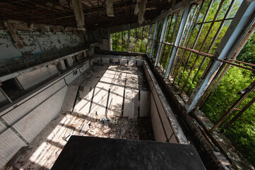 Azure Swimming Pool in Pripyat, Chernobyl exclusion Zone. Chernobyl Nuclear Power Plant Zone of...
