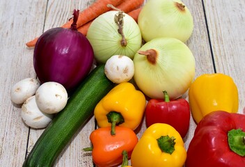 Fresh organic summer harvested vegetables washed and ready for preparing healthy meals and side dishes to share as a family