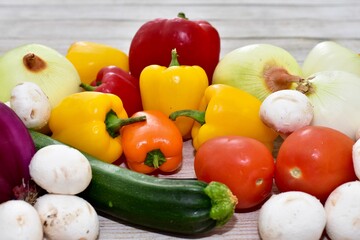 Fresh organic summer harvested vegetables washed and ready for preparing healthy meals and side dishes to share as a family