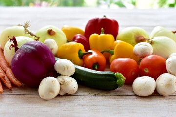 Fresh organic summer harvested vegetables washed and ready for preparing healthy meals and side dishes to share as a family