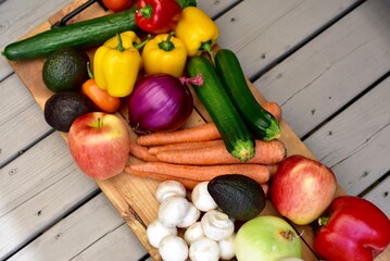Fresh organic summer harvested vegetables washed and ready for preparing healthy meals and side dishes to share as a family