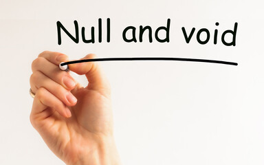 Hand writing inscription - null and void - with marker, concept, the letters in black