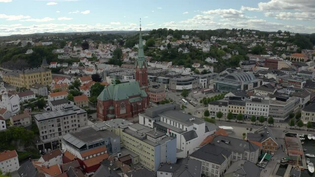 Trinity Church And The Arendal City In Agder County, Norway.  - aerial drone