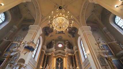 Fototapeta na wymiar The interior of the catholic church. Video on the move.