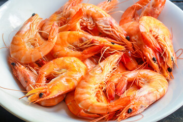shrimp cooked seafood ready to eat prawn Menu serving size. food background top view copy space organic healthy eating raw pescatarian 