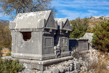 Fototapeta na wymiar sarcophagus ruins in ancient sidyma city, Sidyma Ruins, Fethiye, Mugla, Turkey.