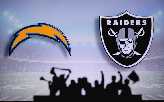 Los Angeles Chargers vs. Las Vegas Raiders. Fans support on NFL Game. Silhouette of supporters, big screen with two rivals in background.