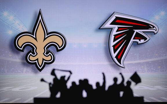 New Orleans Saints vs. Atlanta Falcons. Fans support on NFL Game. Silhouette of supporters, big screen with two rivals in background.