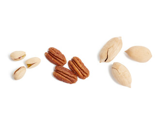 heaps of peeled and unpeeled pecans on a white background