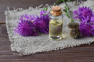 Obraz na płótnie Canvas Essential oils and herbs. Aromatherapy Medicine. Cosmetics.