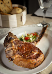 Tomahawk cut plate. Selective focus.
