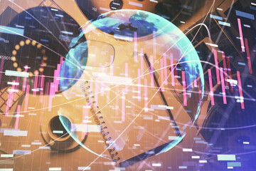 Multi exposure of forex chart drawing and work table top veiw. Concept of financial analysis.