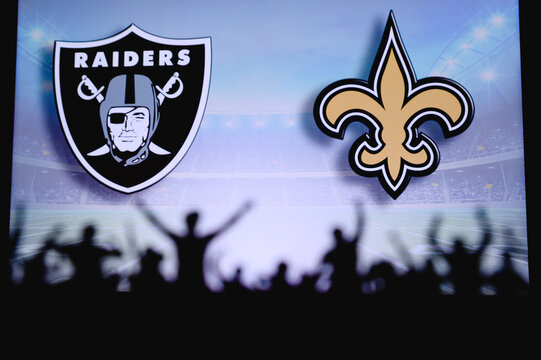 Las Vegas Raiders Vs. New Orleans Saints. Fans Support On NFL Game. Silhouette Of Supporters, Big Screen With Two Rivals In Background.