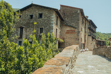 Fototapeta na wymiar BEGET GIRONA, SPAIN - JULY 2020: Medieval mountain village in the middle of nature. Beget, Girona in Catalonia
