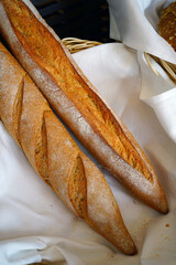 Basket of freshly baked baguette breads