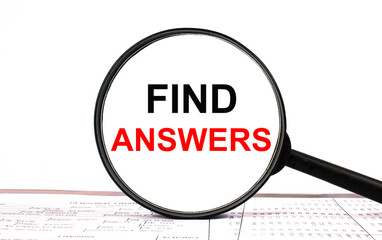 Magnifying glass with text Find Answers on financial tables