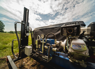 Soil examination. Collecting black soil on the field for examination