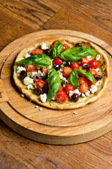 Pizza. Classic traditional Italian entrée favorite. New York Style Pizza with marinara sauce and topped with mozzarella cheese, meats and fresh vegetables. Baked in wood burning oven