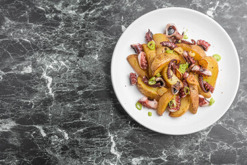 蛸とポテトの炒め物