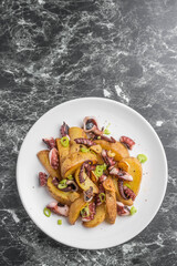 蛸とポテトの炒め物