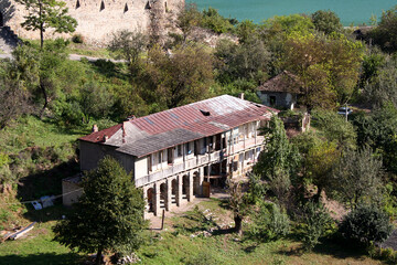 Obraz na płótnie Canvas Traditional old house at Kazbegi-Tbilisi road in Georgia.