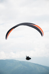 pure adrenaline by paragliding over the city