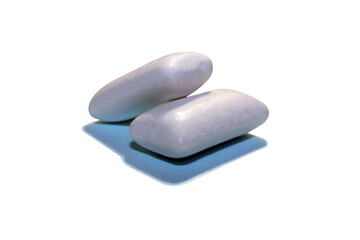 White chewing gums, on a light background.  Refresh your breath, dentist's advice.