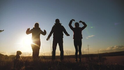 happy family teamwork silhouette jumping for joy and happiness. concept success victory in business goal achievement. a group of people jump lifestyle rejoice shout