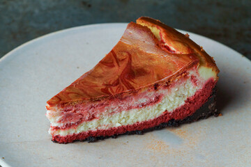 Slice of red velvet cheesecake