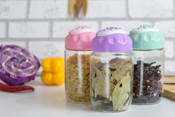 colorful jars for spices and herbs