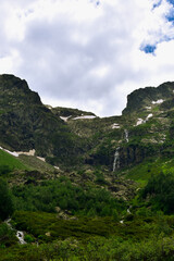 Beautiful view of the Caucasus mountains. In the background are waterfalls from the snowy peaks of the Caucasus.