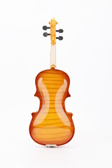 Close up of the back of a wooden violin with a smooth surface