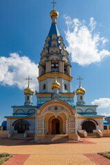 Fototapeta na wymiar The bell tower of the Temple unfading color in Moscow, Russia