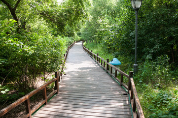 Obraz premium China, Heihe, July 2019: Walking path in the Park on the embankment in Heihe city in summer